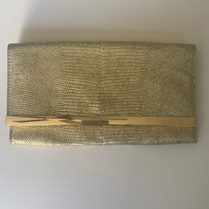 Authentic Michael Kors gold clutch